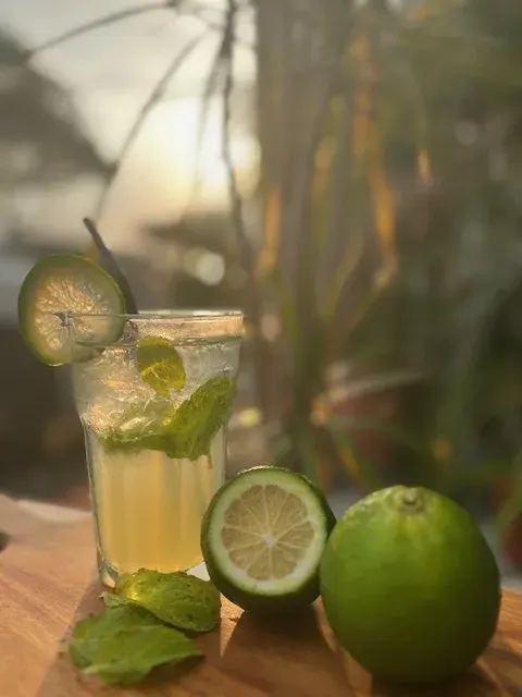 Lime mojito on a wooden board